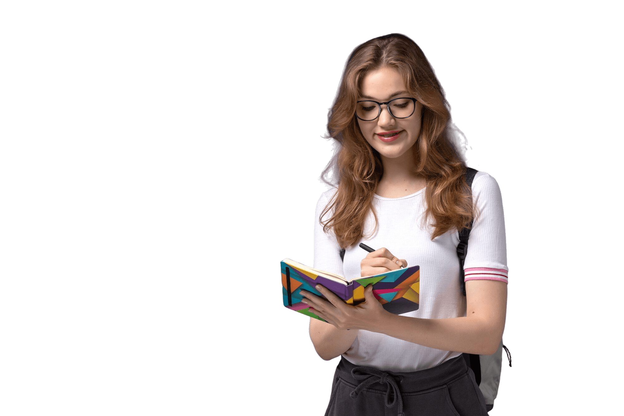 General English student writing in a notebook